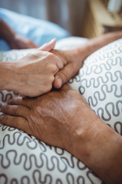 Nurse holding hand